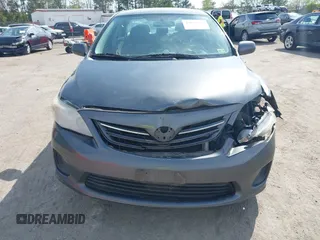 2013 Toyota Corolla L with VIN 2T1BU4EE7DC100830, listed as a IAAI auction lot 42032150 with 205,914 mi miles. Bid and sale history available at carsss.com. Image 12.