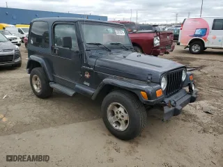 2002 Jeep Wrangler Sahara with VIN 1J4FA59S42P776905, listed as a Copart auction lot 53373015 with 231,915 mi miles and Clean Title. Bid and sale history available at carsss.com. Image 4.