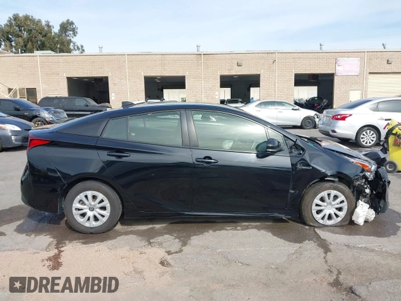 2022 Toyota Prius L Eco with VIN JTDKAMFU2N3157283, listed as a IAAI auction lot 41620334 with 59,754 mi miles and . Bid and sale history available at DreamBid. Image 12.