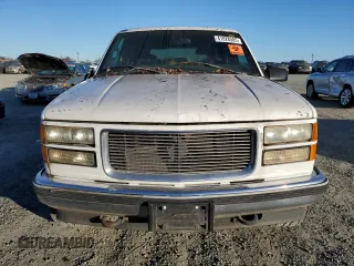 1997 GMC Yukon with VIN 1GKEK13R7VJ748007, listed as a Copart auction lot 41828585 with 209,516 mi miles and Clean Title. Bid and sale history available at carsss.com. Image 5.
