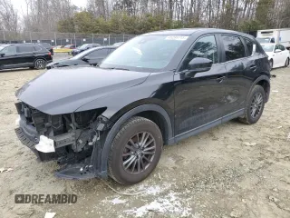 2020 Mazda CX-5 Touring with VIN JM3KFACM1L0767976, listed as a Copart auction lot 46299715 with 148,137 mi miles and Salvage Title. Bid and sale history available at carsss.com. Image 1.