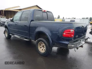 2003 Ford F-150 XLT with VIN 1FTRW08L33KC62060, listed as a IAAI auction lot 41618936 with 276,251 mi miles. Bid and sale history available at carsss.com. Image 3.