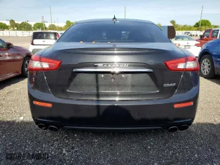 2016 Maserati Ghibli with VIN ZAM57XSAXG1189742, listed as a Copart auction lot 50397213 with 59,715 mi miles. Bid and sale history available at carsss.com. Image 6.