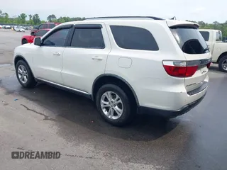 2012 Dodge Durango Crew with VIN 1C4RDHDG9CC152766, listed as a IAAI auction lot 42038931 with 288,545 mi miles and . Bid and sale history available at DreamBid. Image 3.