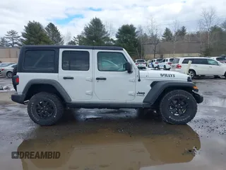 2022 Jeep Wrangler Unlimited Sport S with VIN 1C4HJXDG3NW155467, listed as a IAAI auction lot 41638650 with 22,698 mi miles and . Bid and sale history available at DreamBid. Image 13.