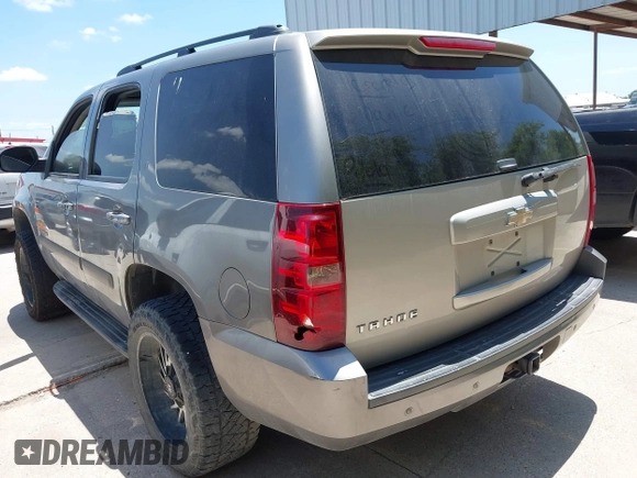 2007 Chevrolet Tahoe LT with VIN 1GNFC13007J405418, listed as a IAAI auction lot 42631830 with 225,156 mi miles and . Bid and sale history available at DreamBid. Image 3.