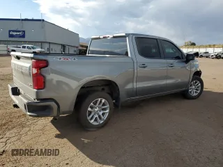 2023 Chevrolet Silverado 1500 RST with VIN 1GCUDEE87PZ141591, listed as a Copart auction lot 76496604 with 60,891 mi miles and Salvage Title. Bid and sale history available at DreamBid. Image 3.