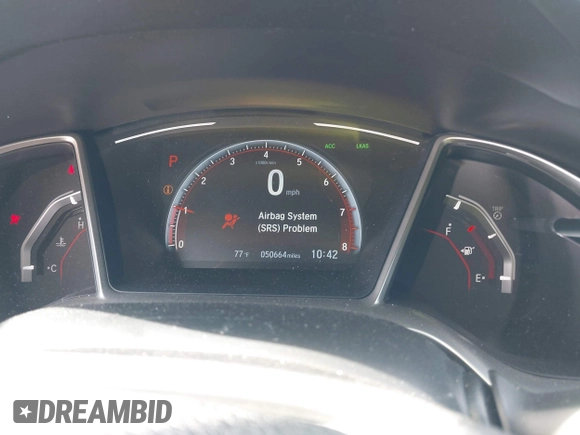 2021 Honda Civic Sport with VIN 2HGFC2F84MH536320, listed as a IAAI auction lot 42145631 with 50,664 mi miles and . Bid and sale history available at DreamBid. Image 7.