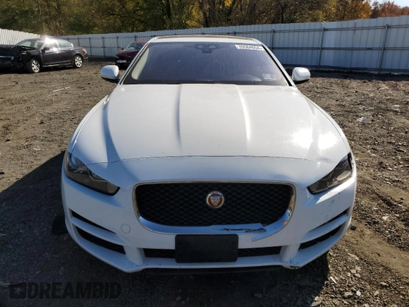2019 Jaguar XE 25t with VIN SAJAR4FX8KCP52067, listed as a Copart auction lot 76584654 with 82,069 mi miles and Salvage Title. Bid and sale history available at carsss.com. Image 5.