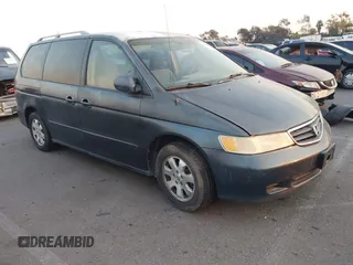 2003 Honda Odyssey EX with VIN 5FNRL186X3B019965, listed as a IAAI auction lot 41262689 with 246,464 mi miles and . Bid and sale history available at carsss.com. Image 1.