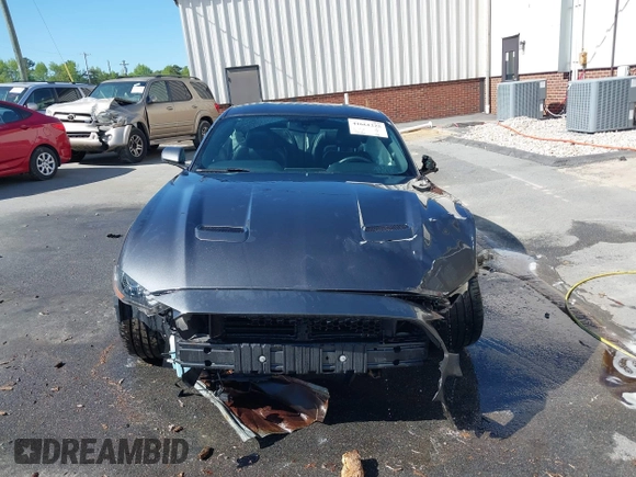 2018 Ford Mustang GT z VIN 1FA6P8CF3J5182601, wystawiony jako IAAI lot #41661225 z przebiegiem 67 898 mil mil oraz . Historia ofert i sprzedaży dostępna na DreamBid. Obrazek 13.