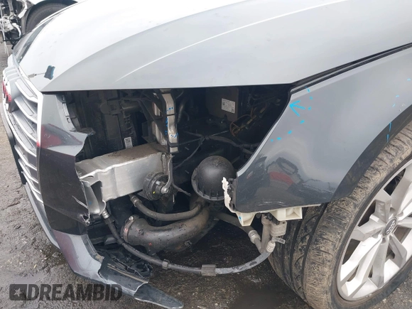 2019 Audi A4 Premium z VIN WAUGMAF44KA060327, wystawiony jako IAAI lot #41757099 z przebiegiem 52 110 mil mil oraz . Historia ofert i sprzedaży dostępna na DreamBid. Obrazek 6.
