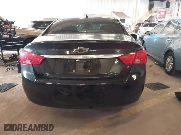 2015 Chevrolet Impala LT z VIN 1G1115SL2FU120009, wystawiony jako IAAI lot #41885579 z przebiegiem 124 190 mil mil oraz . Historia ofert i sprzedaży dostępna na DreamBid. Obrazek 16.