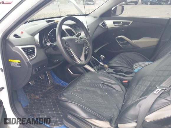 2012 Hyundai Veloster w/Gray Int with VIN KMHTC6AD6CU021176, listed as a IAAI auction lot 42205695 with 93,665 mi miles and . Bid and sale history available at DreamBid. Image 5.