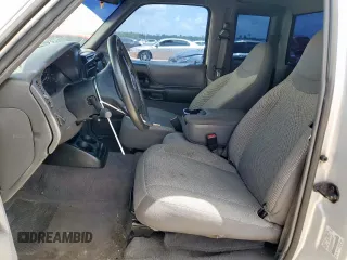 2001 Ford Ranger XL with VIN 1FTYR14V01PB46542, listed as a Copart auction lot 60977205 with 230,933 mi miles and Salvage title. Bid and sale history available at DreamBid. Image 7.