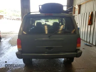 1998 Jeep Cherokee Country with VIN 1J4FT78S8WL252502, listed as a Copart auction lot 59664545 with 133,148 mi miles and Salvage title. Bid and sale history available at DreamBid. Image 6.