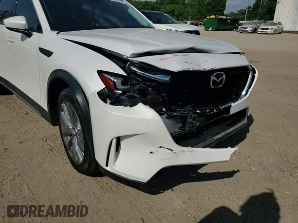 2024 Mazda CX-90 Premium z VIN JM3KKDHD5R1189566, wystawiony jako Copart lot #53689405 z przebiegiem Nie podano mil oraz Szkoda całkowita • Salvage title. Historia ofert i sprzedaży dostępna na DreamBid. Obrazek 11.