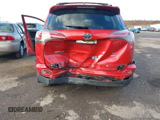 2016 Toyota RAV4 LE with VIN JTMBFREVXGJ100692, listed as a IAAI auction lot 41847333 with 130,822 mi miles. Bid and sale history available at carsss.com. Image 6.