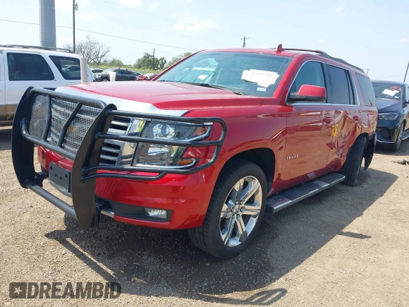 2015 Chevrolet Tahoe LT with VIN 1GNSKBKC6FR628355, listed as a IAAI auction lot 42159743 with 95,730 mi miles and . Bid and sale history available at DreamBid. Image 17.
