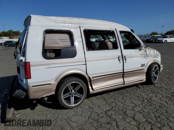 2000 Chevrolet Astro Cargo YF7 z VIN 1GBDM19W1YB211571, wystawiony jako Copart lot #52156885 z przebiegiem 211 508 mil mil oraz Nie do naprawy • Non repairable. Historia ofert i sprzedaży dostępna na DreamBid. Obrazek 3.