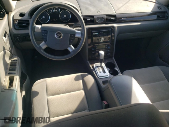 2006 Mercury Montego Luxury z VIN 1MEFM40116G601835, wystawiony jako Copart lot #85929224 z przebiegiem Nie podano mil oraz Szkoda całkowita • Salvage title. Historia ofert i sprzedaży dostępna na DreamBid. Obrazek 8.