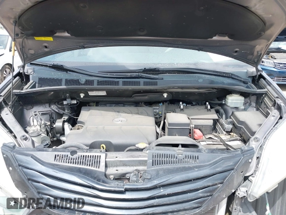 2013 Toyota Sienna LE AAS with VIN 5TDKK3DC1DS392577, listed as a IAAI auction lot 41932168 with 90,643 mi miles and . Bid and sale history available at DreamBid. Image 10.