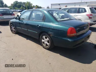 1999 Hyundai Sonata GLS with VIN KMHWF35V9XA100869, listed as a Copart auction lot 68219694 with 144,388 mi miles and Non Repairable. Bid and sale history available at carsss.com. Image 2.