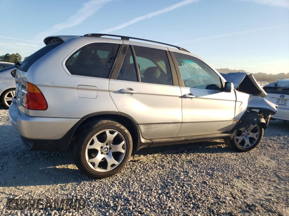 2000 BMW X5 4.4i with VIN WBAFB3355YLH05755, listed as a Copart auction lot 77136744 with 0 mi miles and Salvage Title. Bid and sale history available at carsss.com. Image 3.