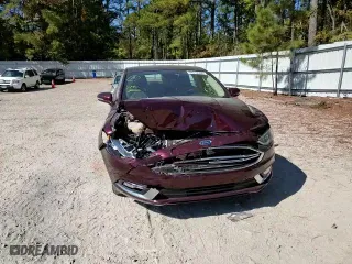 2017 Ford Fusion Energi Titanium with VIN 3FA6P0SU2HR253960, listed as a Copart auction lot 64313662 with 148,424 mi miles. Bid and sale history available at carsss.com. Image 11.