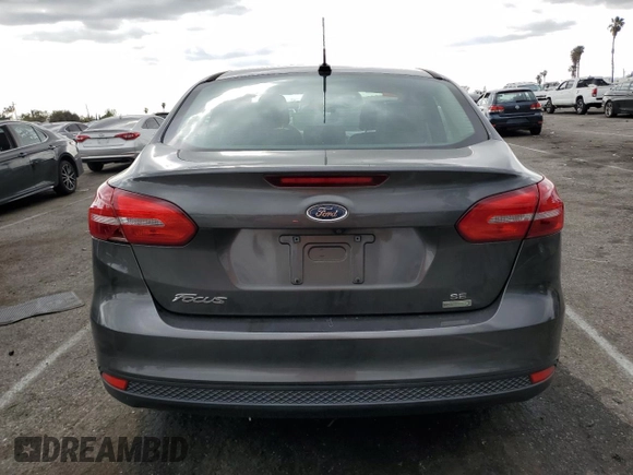 2017 Ford Focus SE with VIN 1FADP3FE3HL235896, listed as a Copart auction lot 50910975 with 74,502 mi miles and Salvage Title. Bid and sale history available at carsss.com. Image 6.