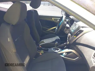 2016 Hyundai Veloster with VIN KMHTC6AD3GU270895, listed as a IAAI auction lot 42139765 with 138,884 mi miles. Bid and sale history available at carsss.com. Image 5.