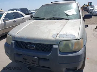 2003 Ford Escape XLS Popular with VIN 1FMYU02103KE20195, listed as a IAAI auction lot 41830663 with 262,580 mi miles. Bid and sale history available at carsss.com. Image 12.