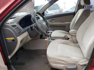 2009 Kia Spectra EX with VIN KNAFE221195645623, listed as a Copart auction lot 68252314 with 157,500 mi miles and Salvage Title. Bid and sale history available at carsss.com. Image 7.