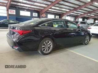 2020 Toyota Avalon Hybrid XLE z VIN 4T1A21FB3LU013217, wystawiony jako Copart lot #59955515 z przebiegiem 302 338 mil mil oraz Czysty tytuł • Clean title. Historia ofert i sprzedaży dostępna na DreamBid. Obrazek 3.