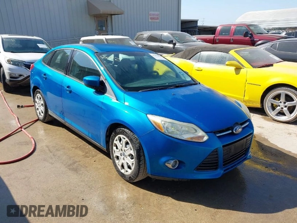 2012 Ford Focus SE with VIN 1FAHP3F24CL415176, listed as a IAAI auction lot 41993864 with 103,805 mi miles. Bid and sale history available at carsss.com. Image 1.