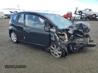 2009 Honda Fit Sport z VIN JHMGE88409S050001, wystawiony jako Copart lot #56575235 z przebiegiem Nie podano mil oraz Nie do naprawy • Non repairable. Historia ofert i sprzedaży dostępna na DreamBid. Obrazek 4.