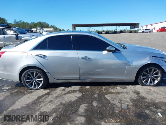 2017 Cadillac CTS Luxury RWD with VIN 1G6AR5SS4H0186842, listed as a IAAI auction lot 40931575 with 166,377 mi miles and . Bid and sale history available at DreamBid. Image 14.