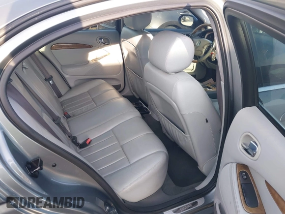 2003 Jaguar S-Type with VIN SAJEA01T23FM93839, listed as a IAAI auction lot 41891973 with 153,761 mi miles and . Bid and sale history available at DreamBid. Image 8.