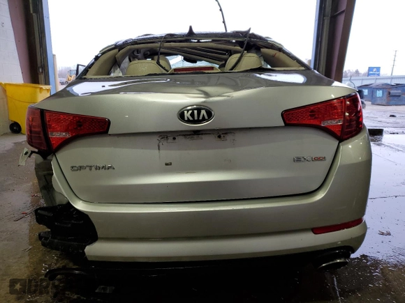 2013 Kia Optima EX с VIN 5XXGN4A70DG239393, выставлен на аукционе Copart как лот 41923615 с пробегом Не указан миль и Списание • Salvage title. История ставок и продаж доступна на DreamBid. Изображение 6.