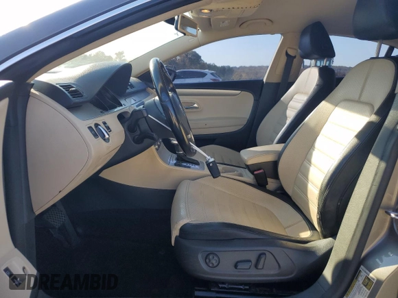 2010 Volkswagen CC Sport with VIN WVWMN7AN3AE541988, listed as a Copart auction lot 77670794 with 100,277 mi miles and Salvage Title. Bid and sale history available at DreamBid. Image 7.