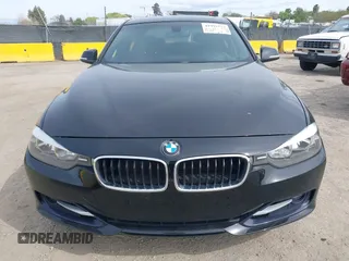 2012 BMW 3 Series 328i with VIN WBA3A5C56CF345904, listed as a IAAI auction lot 41992572 with 136,672 mi miles. Bid and sale history available at carsss.com. Image 6.