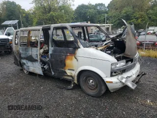 2001 Chevrolet Astro with VIN 1GNDM19W41B133828, listed as a Copart auction lot 71956404 with Not Provided miles and Salvage Title. Bid and sale history available at carsss.com. Image 4.