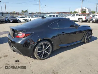 2023 Toyota 86 с VIN JF1ZNBB13P9750286, выставлен на аукционе Copart как лот 57180095 с пробегом 11 630 миль миль и Списание • Salvage title. История ставок и продаж доступна на DreamBid. Изображение 3.