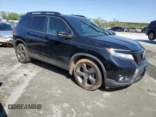 2019 Honda Passport Touring with VIN 5FNYF7H90KB000193, listed as a Copart auction lot 52402915 with 120,968 mi miles and Salvage title. Bid and sale history available at DreamBid. Image 4.