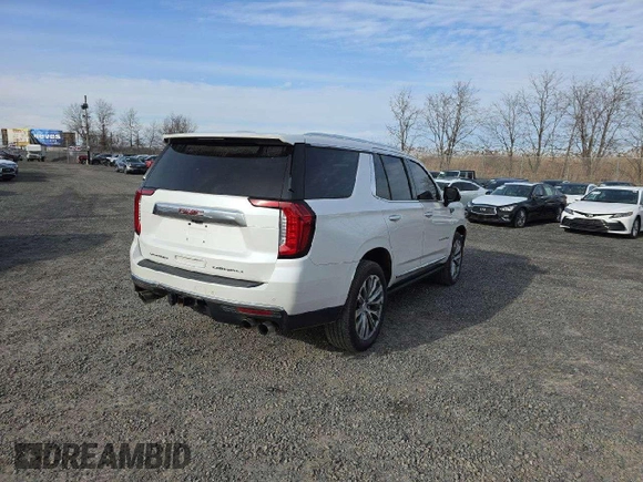 2021 GMC Yukon Denali with VIN 1GKS2DKL4MR143623, listed as a Copart auction lot 41826035 with 92,275 mi miles and Salvage Title. Bid and sale history available at carsss.com. Image 4.