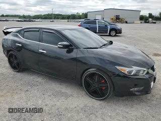 2017 Nissan Maxima SL with VIN 1N4AA6AP6HC432009, listed as a Copart auction lot 65593765 with 32,518 mi miles and Salvage title. Bid and sale history available at DreamBid. Image 4.