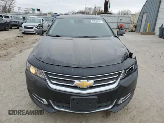 2014 Chevrolet Impala LT with VIN 1G1125S32EU165740, listed as a Copart auction lot 84630694 with 128,215 mi miles and Salvage Title. Bid and sale history available at DreamBid. Image 5.