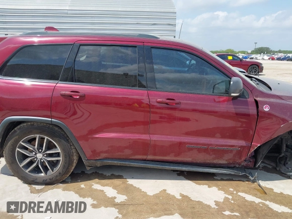 2017 Jeep Grand Cherokee Trailhawk with VIN 1C4RJFLG3HC699828, listed as a IAAI auction lot 42135444 with 98,596 mi miles and . Bid and sale history available at DreamBid. Image 13.