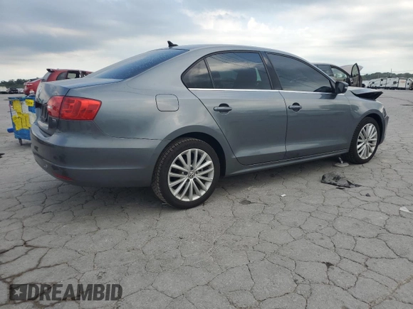 2013 Volkswagen Jetta TDI w/Premium/Nav с VIN 3VWLL7AJ4DM412457, выставлен на аукционе Copart как лот 62503225 с пробегом 91 045 миль миль и Чистый • Clean title. История ставок и продаж доступна на DreamBid. Изображение 3.