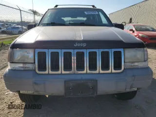 1998 Jeep Grand Cherokee Laredo with VIN 1J4FX58SXWC144715, listed as a Copart auction lot 86423594 with 93,936 mi miles and Clean Title. Bid and sale history available at carsss.com. Image 5.